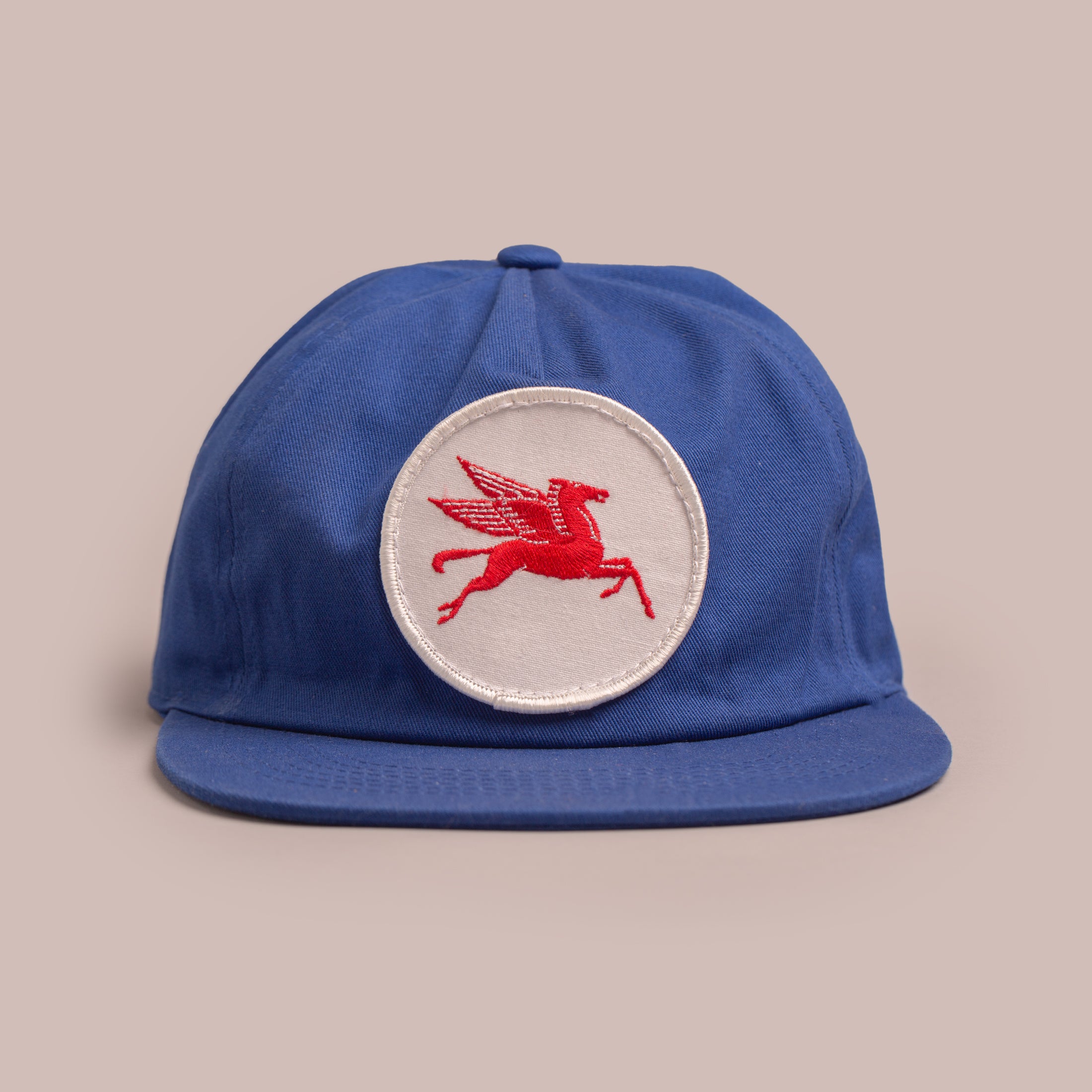 Mobil Pegasus Nissi Cap