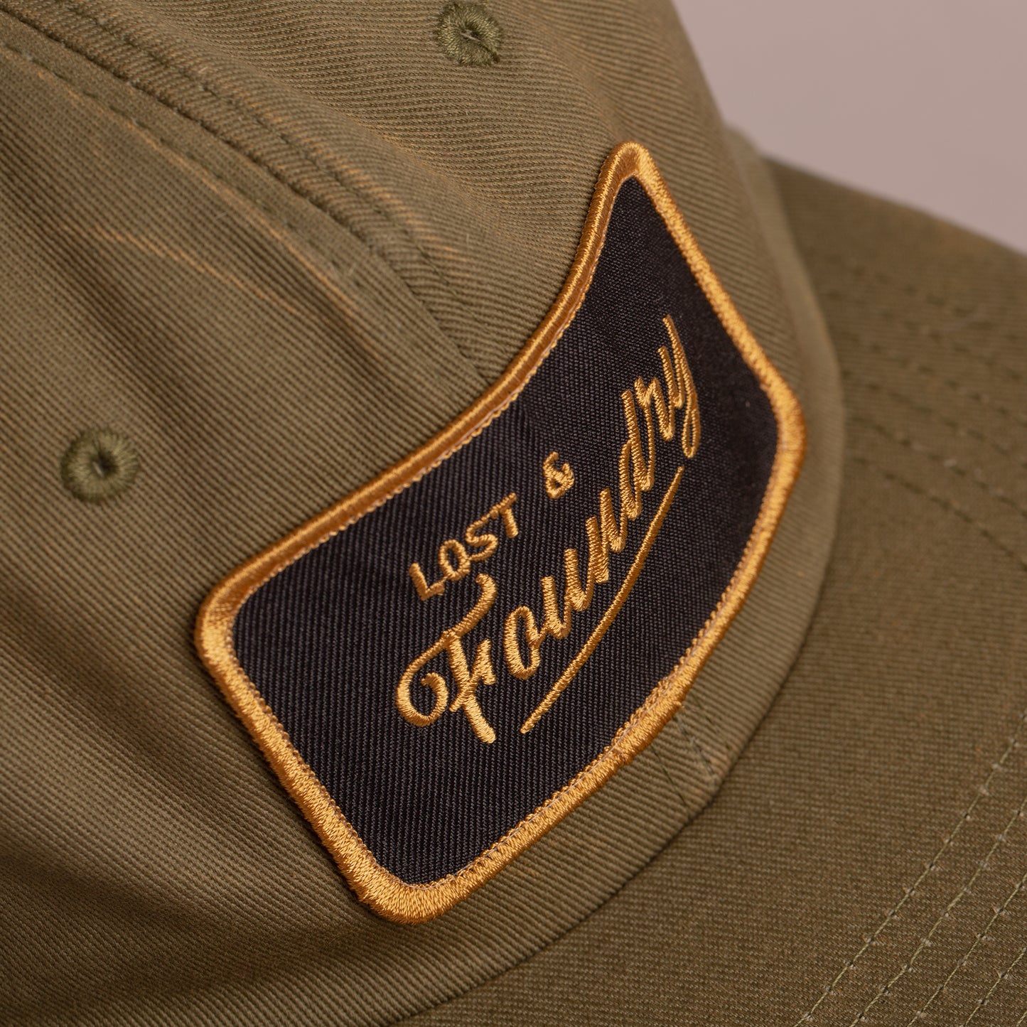 District Patch Hat - Distressed Olive Unstructured Camper
